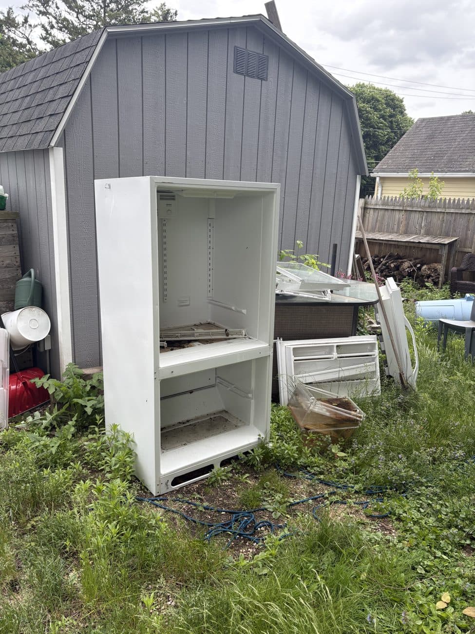 Before: Appliance & Shed Cleanout · Central MA